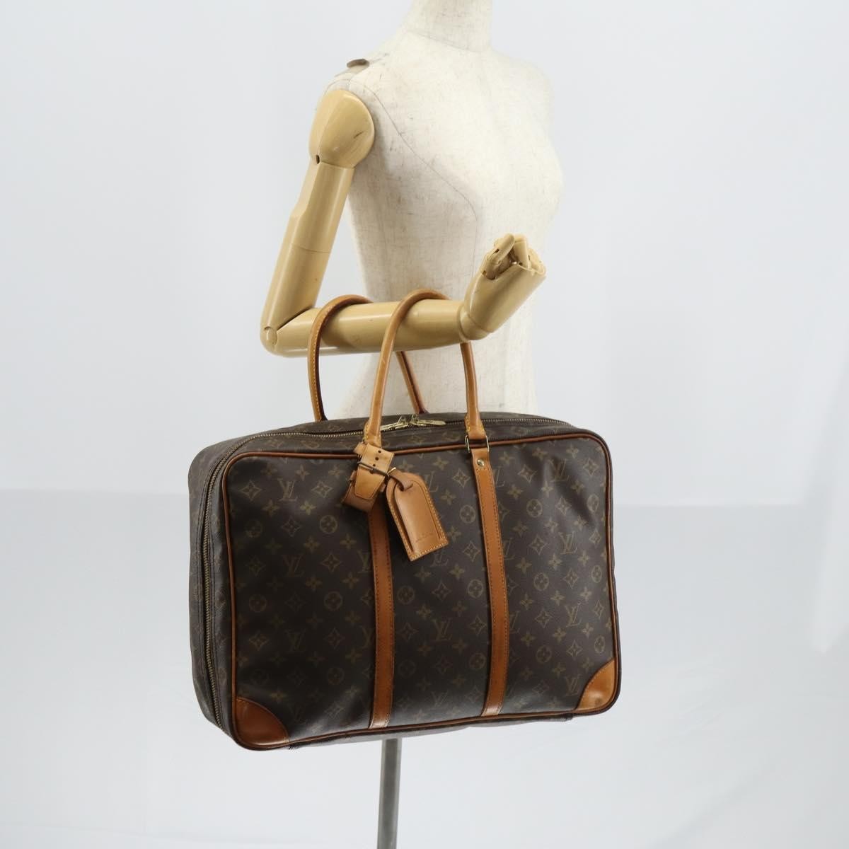 Louis Vuitton Sirius Handbag Monogram Canvas Brown Canvas Travel Bag Bag (Pre-Owned)