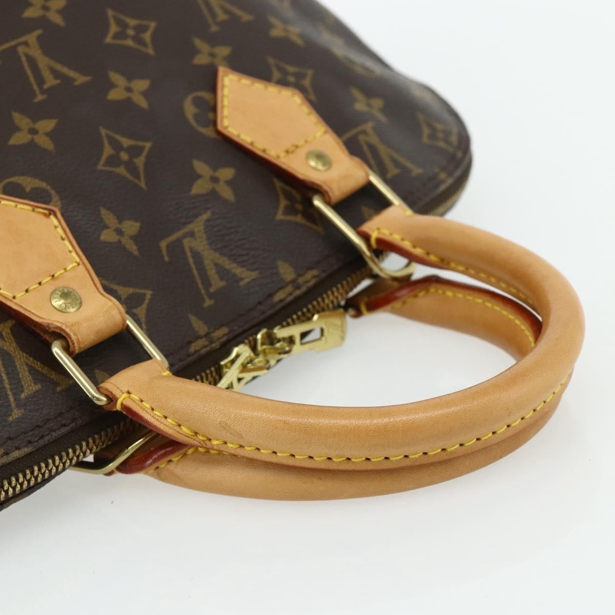 Louis Vuitton Alma Handbag Monogram Canvas Brown Canvas Handbag (Pre-Owned)