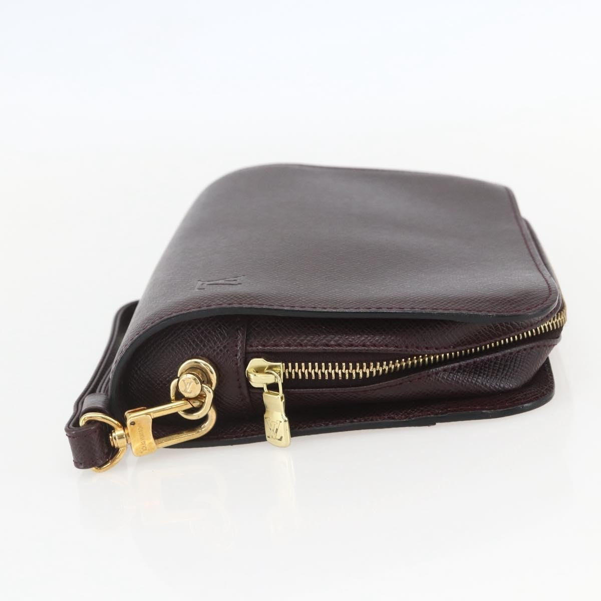 Louis Vuitton Pochette Baikal Clutch Taiga Leather Brown Leather Clutche & Pouche Bag (Pre-Owned)