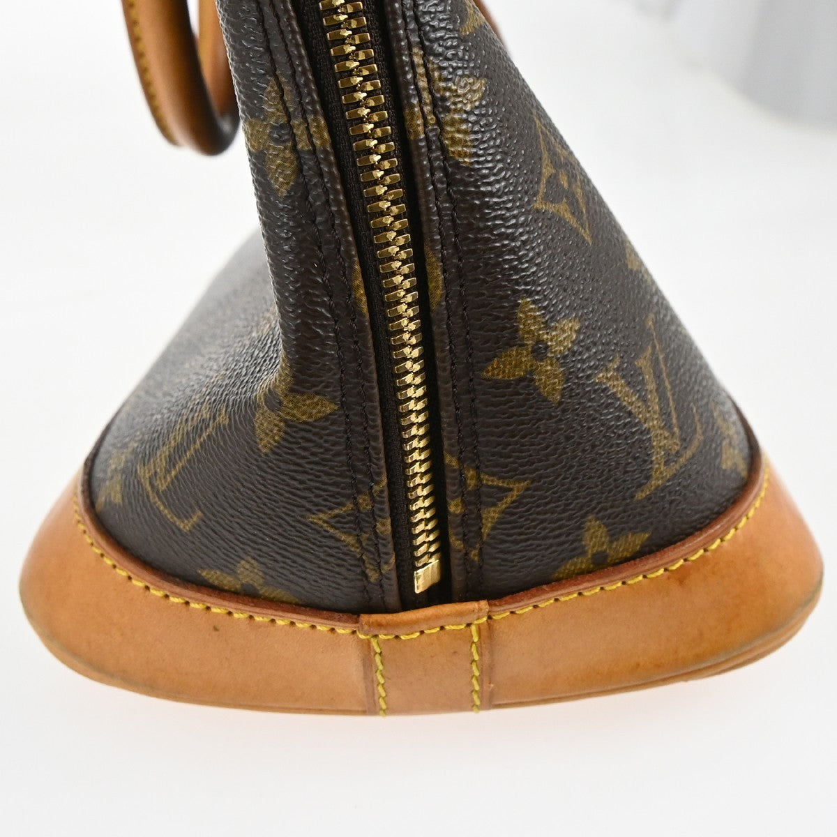 Louis Vuitton Alma Handbag Monogram Canvas Brown Canvas Handbag (Pre-Owned)