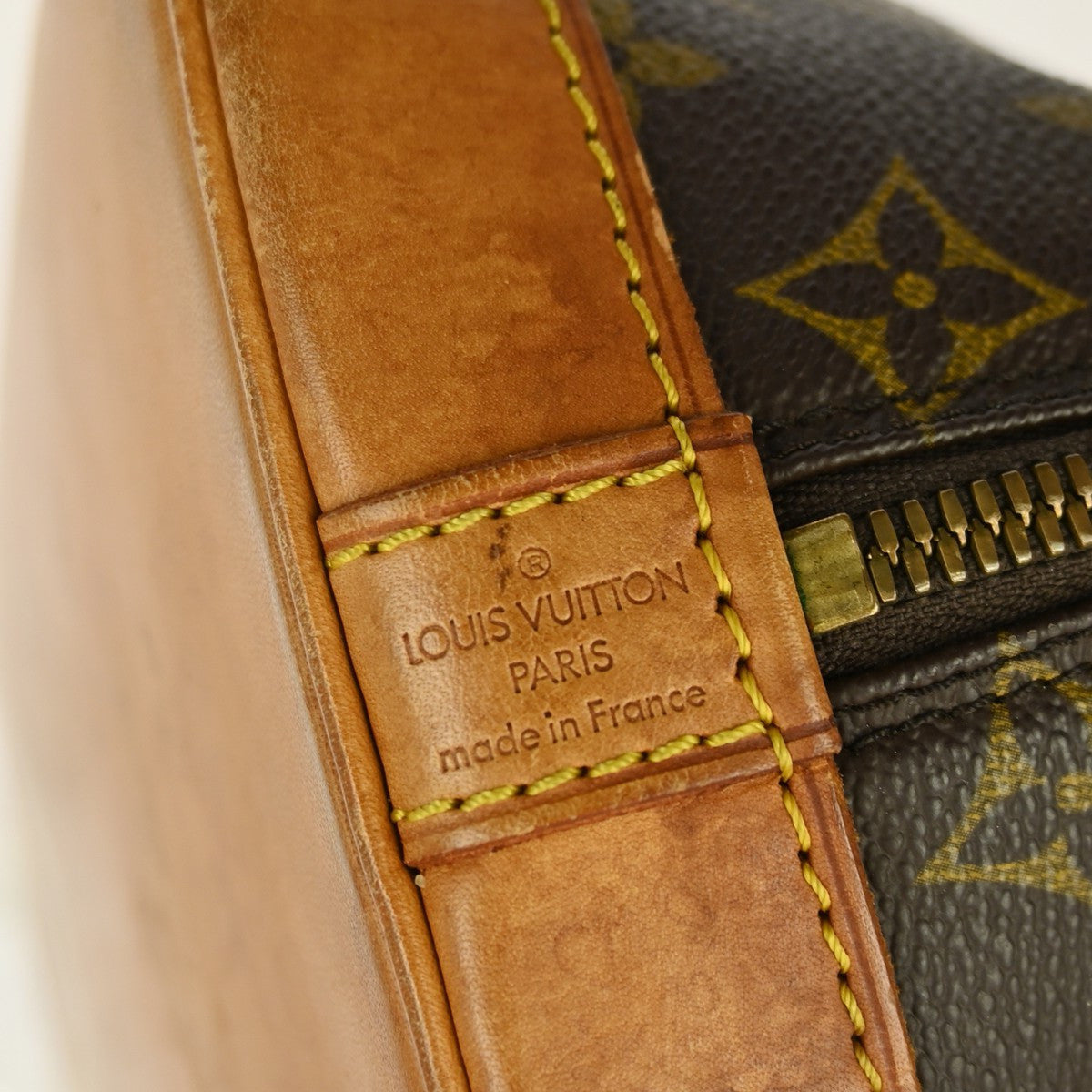 Louis Vuitton Alma Handbag Monogram Canvas Brown Canvas Handbag (Pre-Owned)