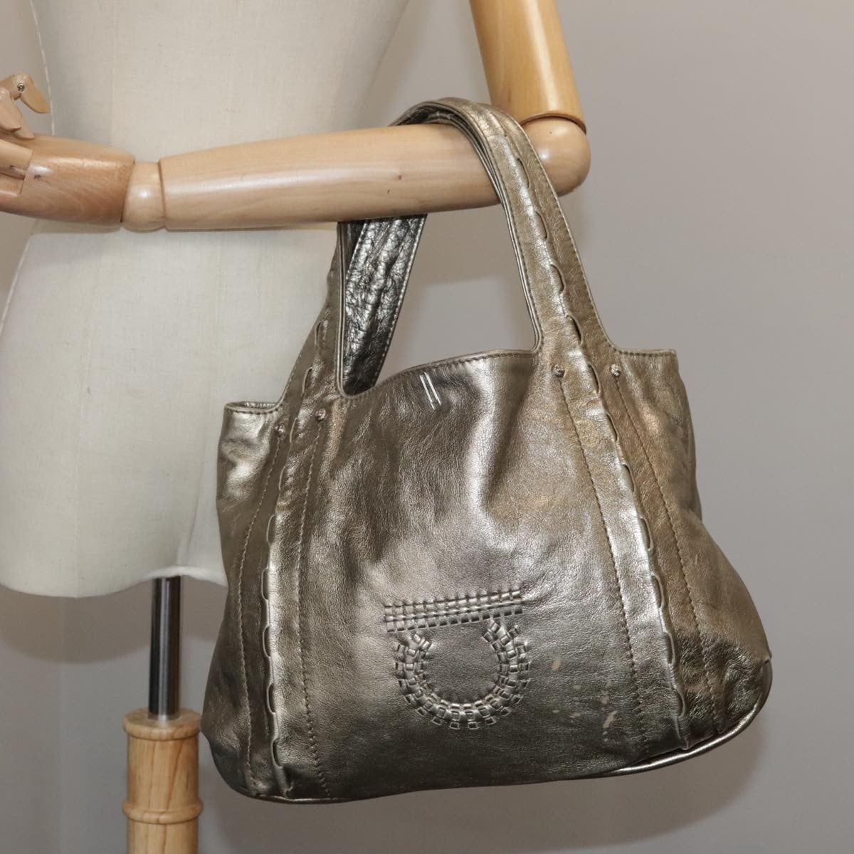 Salvatore Ferragamo Gancini Handbag Leather Gold Leather Handbag (Pre-Owned)