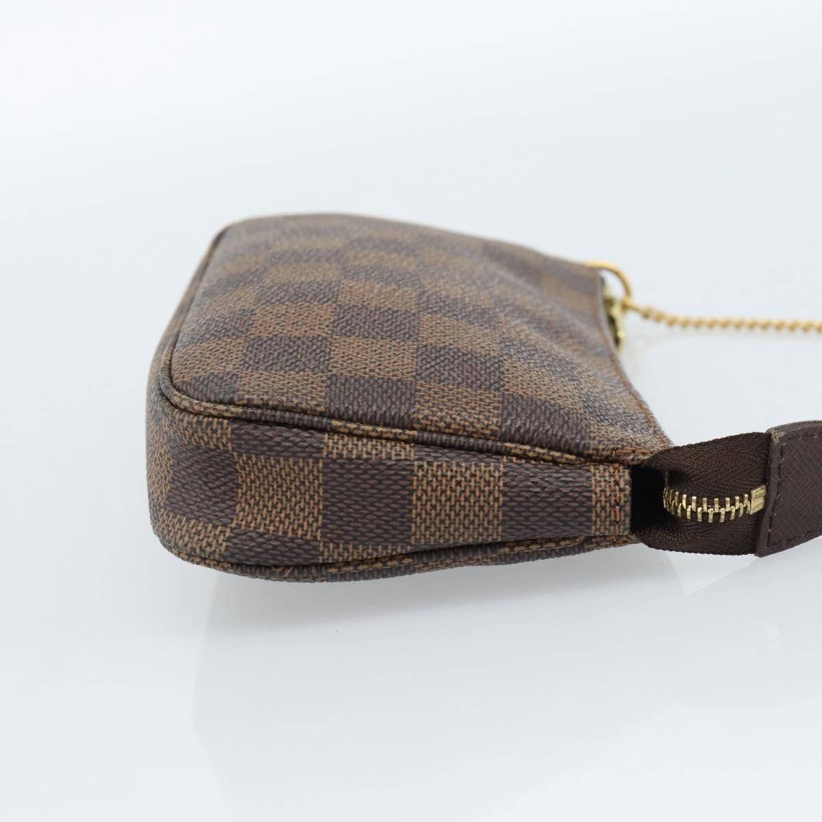 Louis Vuitton Mini Pochette Accessoires Damier Canvas Brown Canvas Clutche & Pouche Bag (Pre-Owned)