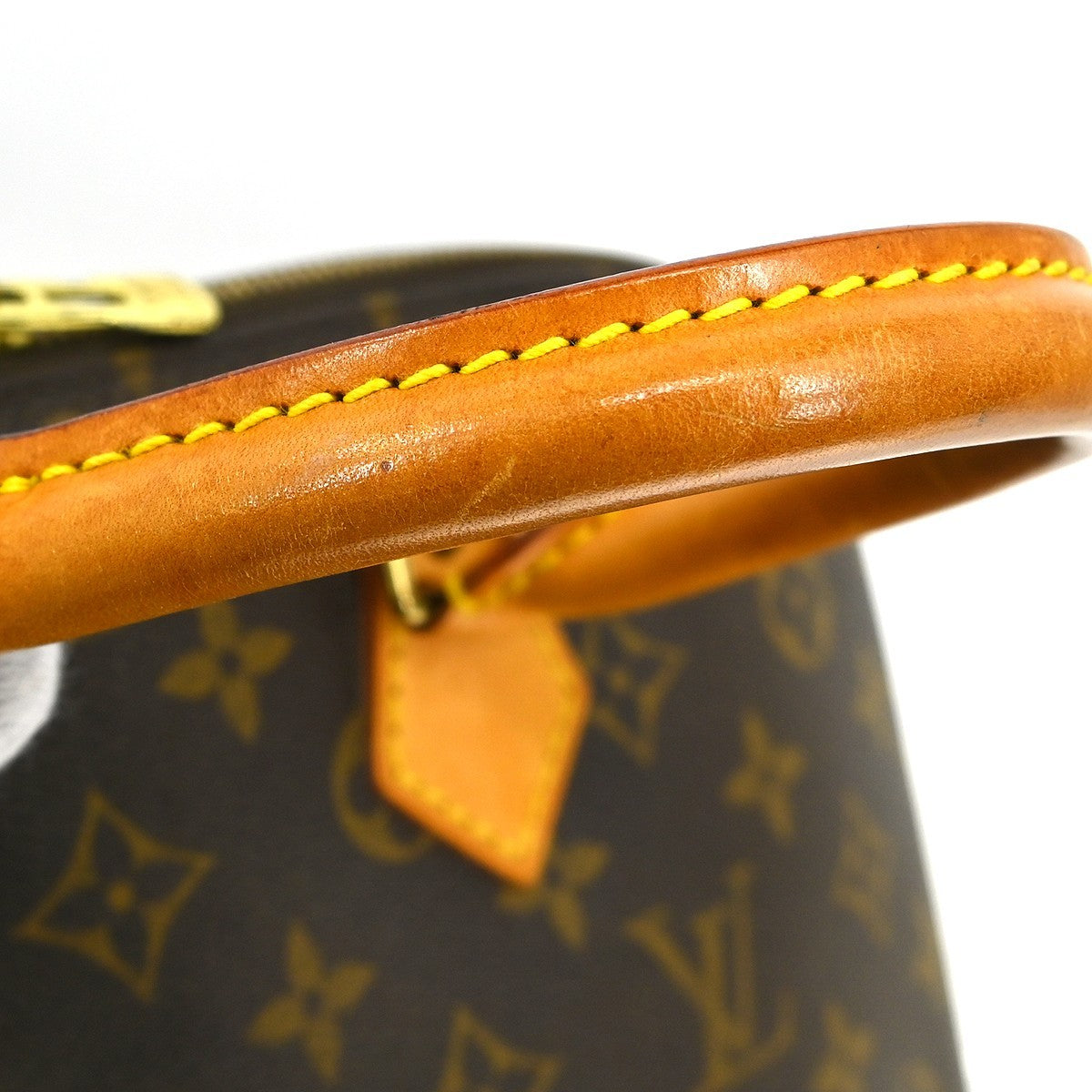 Louis Vuitton Alma Handbag Monogram Canvas Brown Canvas Handbag (Pre-Owned)