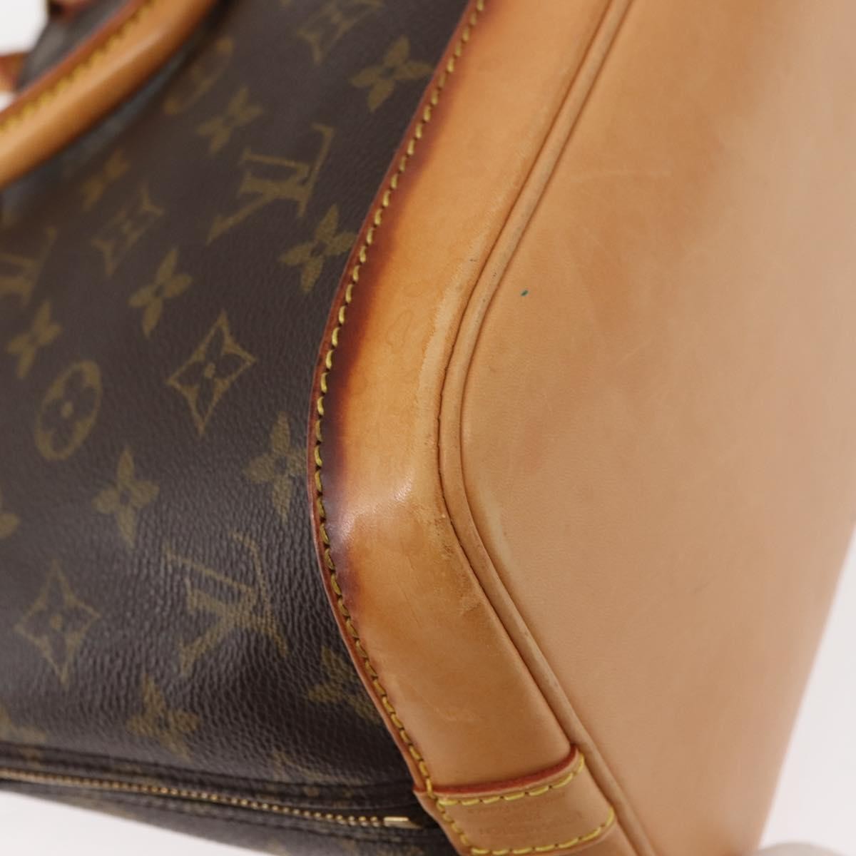 Louis Vuitton Alma Handbag Monogram Canvas Brown Canvas Handbag (Pre-Owned)