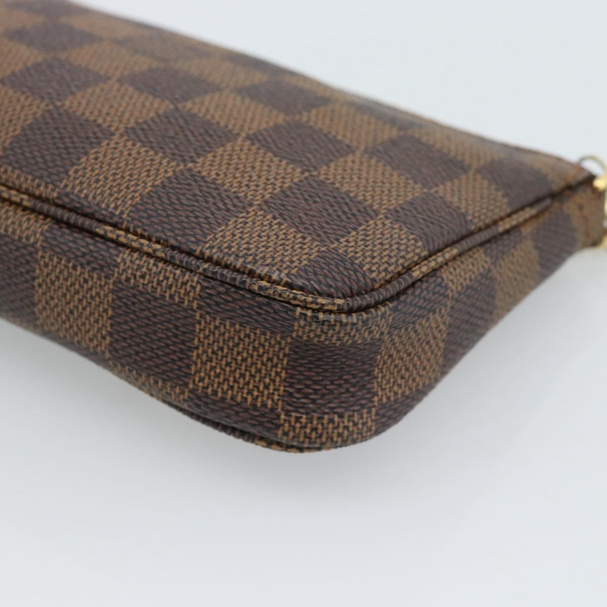 Louis Vuitton Mini Pochette Accessoires Damier Canvas Brown Canvas Clutche & Pouche Bag (Pre-Owned)