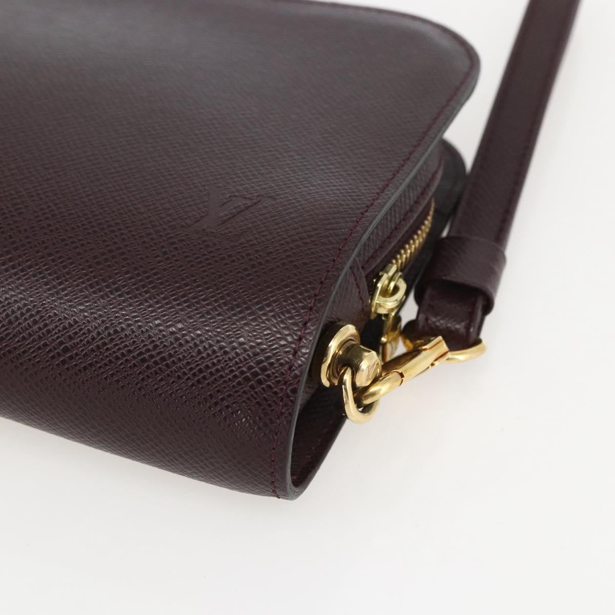 Louis Vuitton Pochette Baikal Clutch Taiga Leather Brown Leather Clutche & Pouche Bag (Pre-Owned)