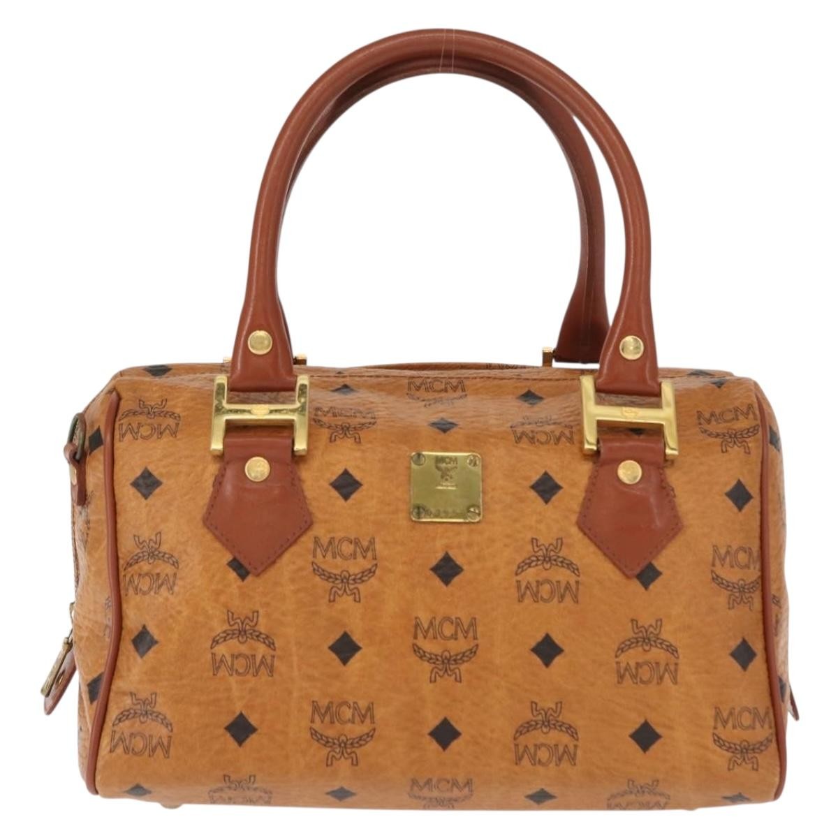 MCM Visetos Logogramme Handbag Canvas And Leather Brown Pvc Handbag (Pre-Owned)