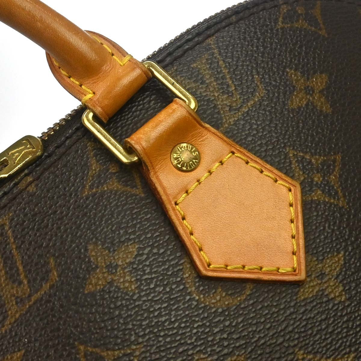 Louis Vuitton Alma Handbag Monogram Canvas Brown Canvas Handbag (Pre-Owned)