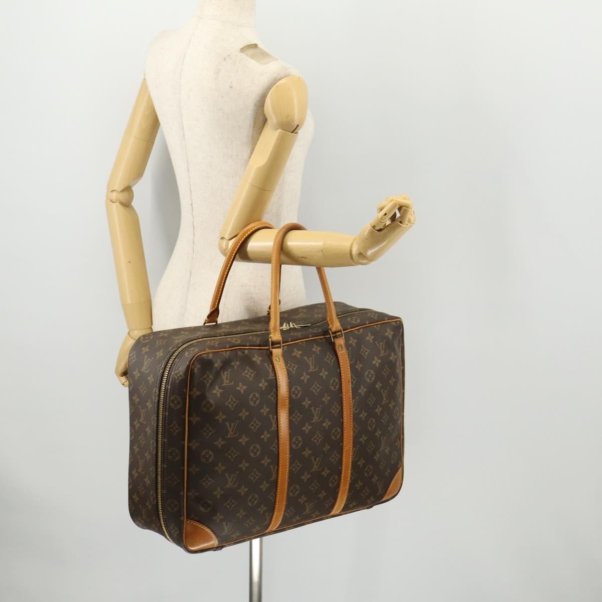 Louis Vuitton Sirius Handbag Monogram Canvas Brown Canvas Travel Bag Bag (Pre-Owned)