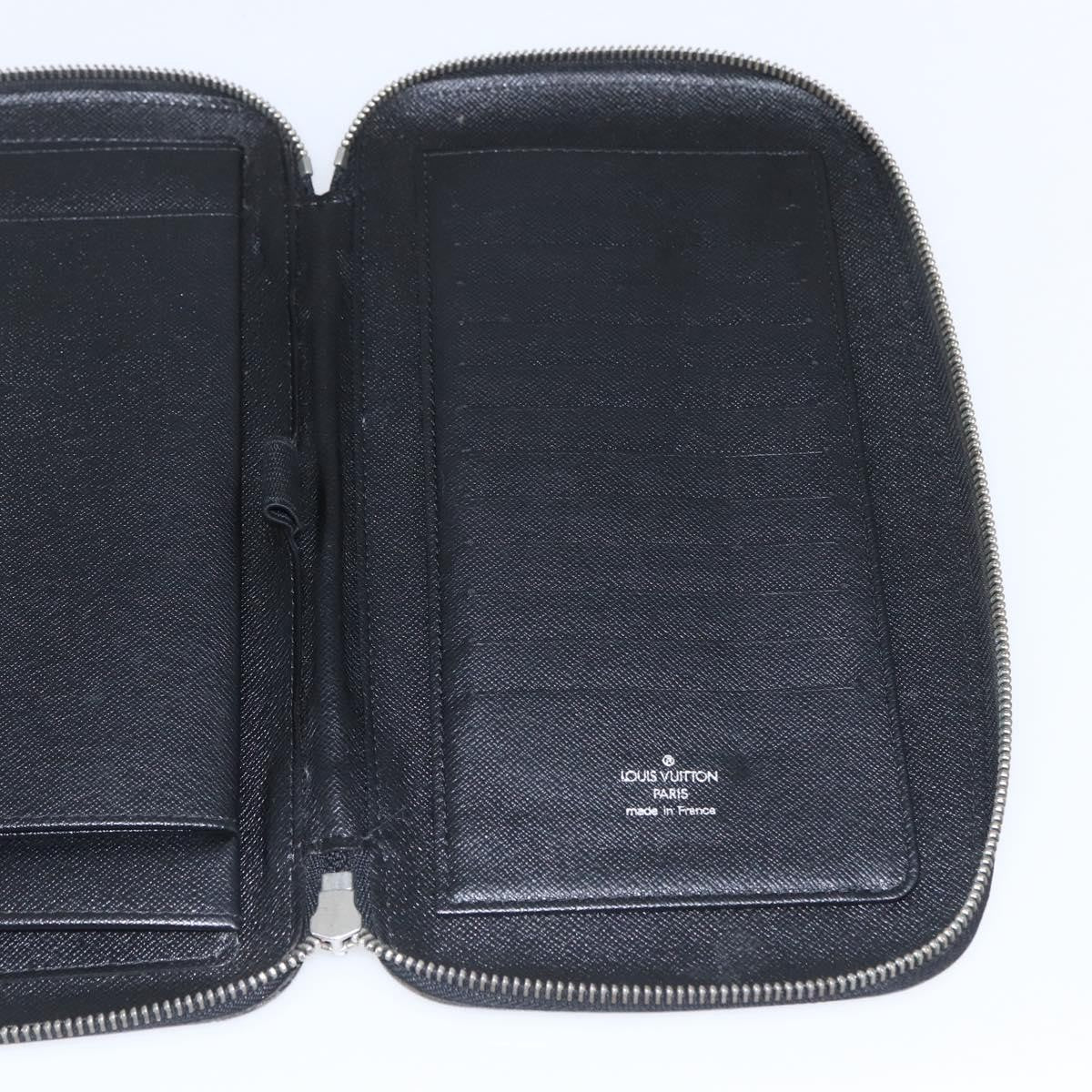 Louis Vuitton Atoll Organizer Wallet Taiga Leather Black Leather Clutche & Pouche Bag (Pre-Owned)