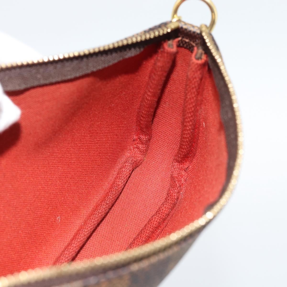 Louis Vuitton Mini Pochette Accessoires Damier Canvas Brown Canvas Clutche & Pouche Bag (Pre-Owned)