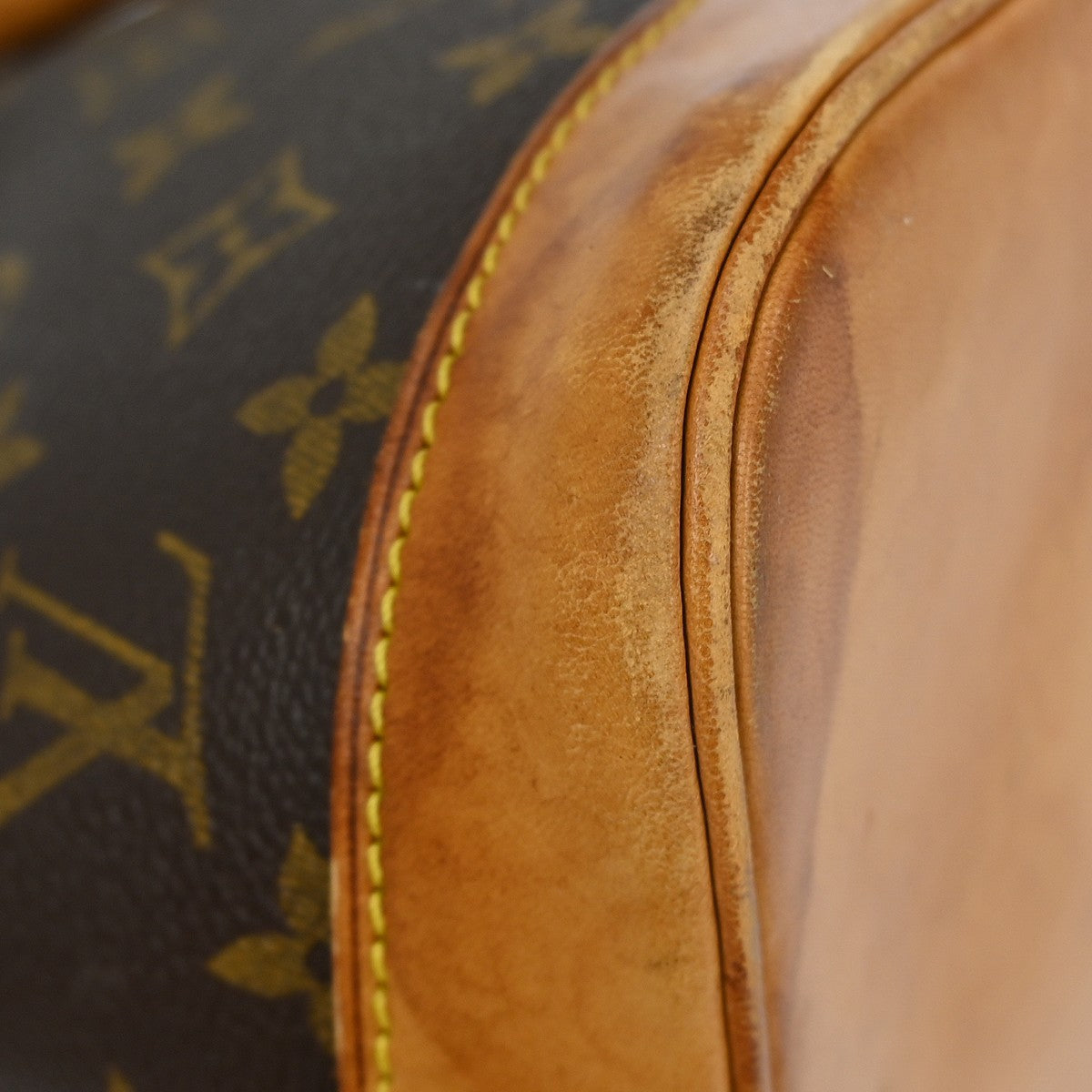 Louis Vuitton Alma Handbag Monogram Canvas Brown Canvas Handbag (Pre-Owned)