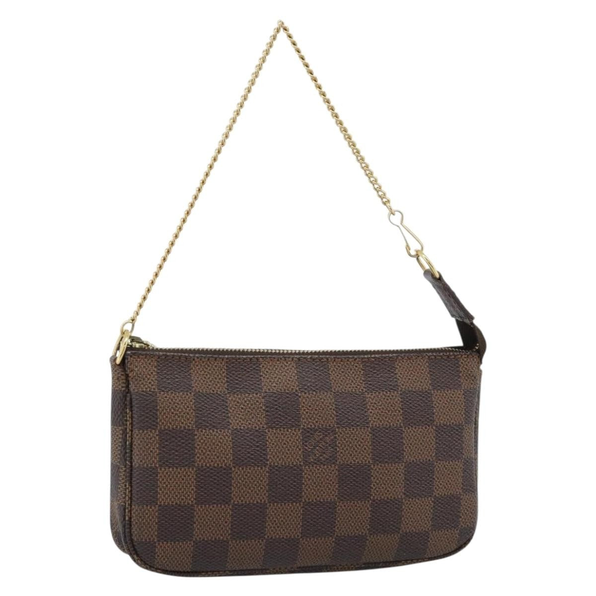 Louis Vuitton Mini Pochette Accessoires Damier Canvas Brown Canvas Clutche & Pouche Bag (Pre-Owned)