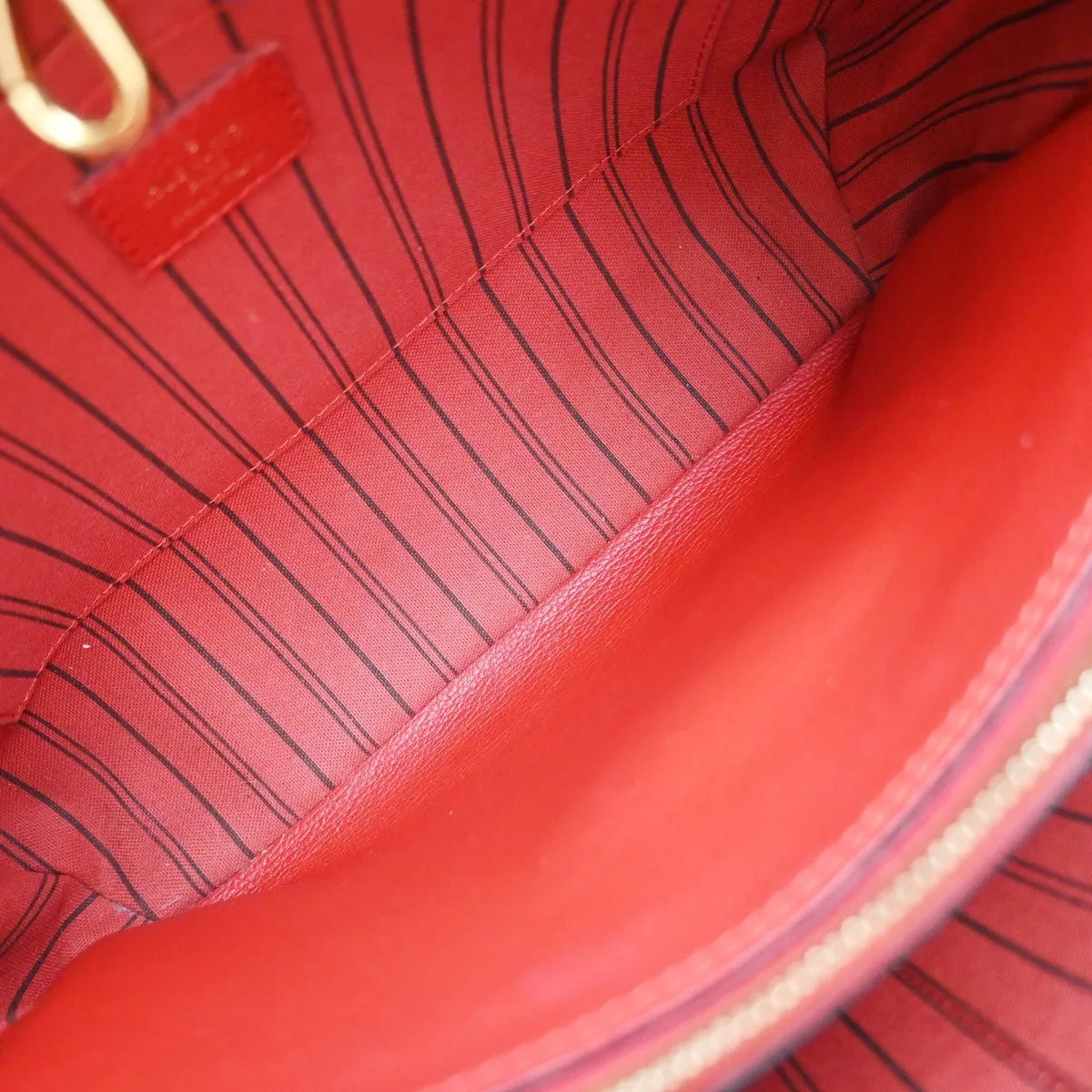 Louis Vuitton Montaigne Monogram Empreinte Leather Red Leather Handbag (Pre-Owned)