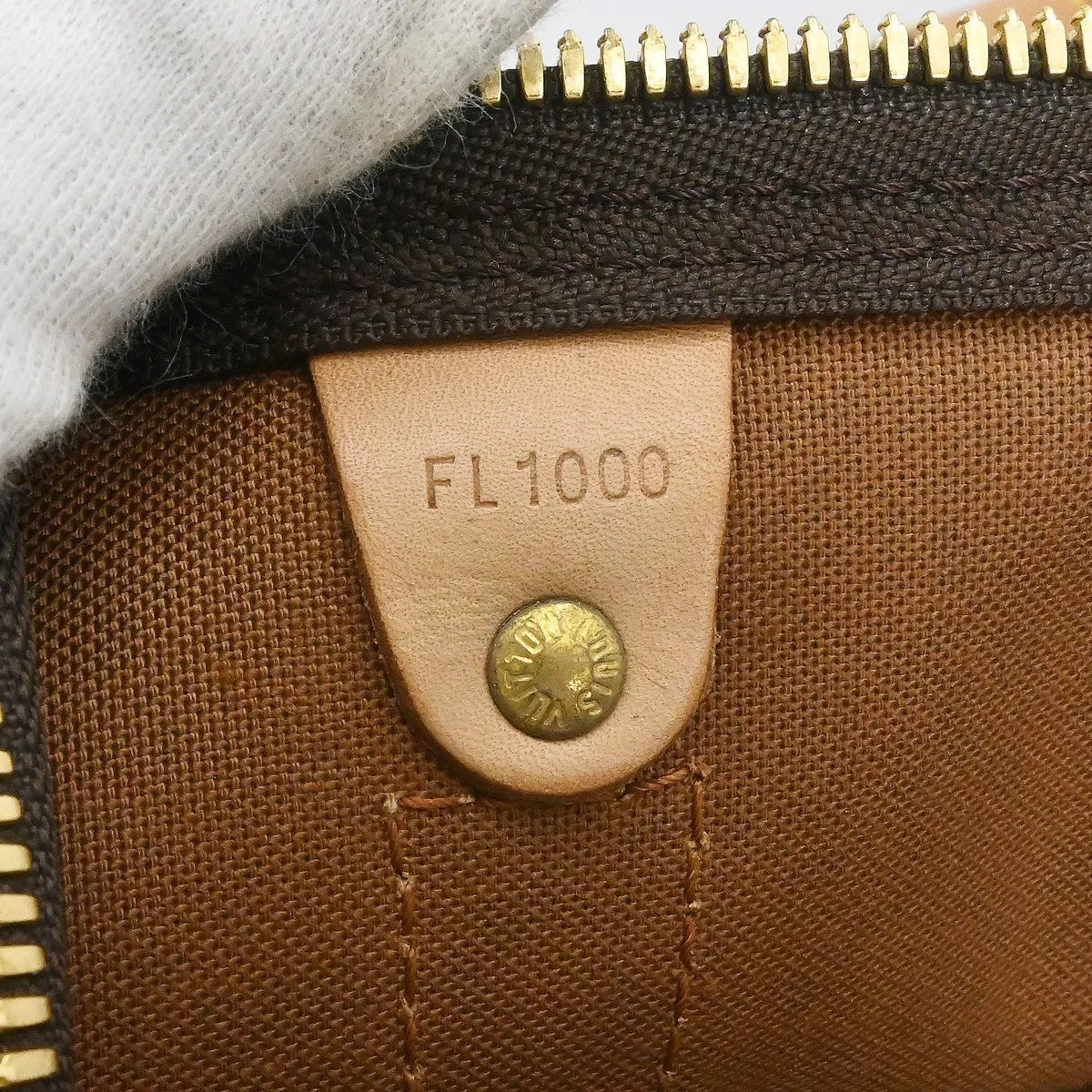 Louis Vuitton Keepall Monogram Canvas Brown Canvas Travel Bag Bag (Pre-Owned)