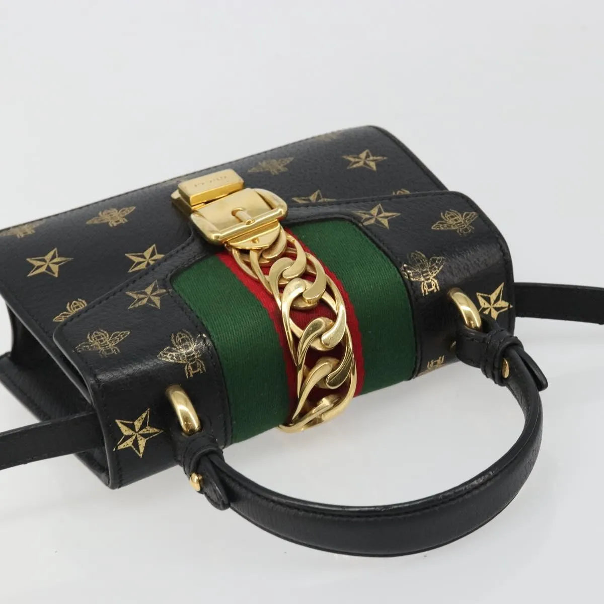 Gucci Sylvie Top Handle Printed Leather Black Leather Handbag (Pre-Owned)