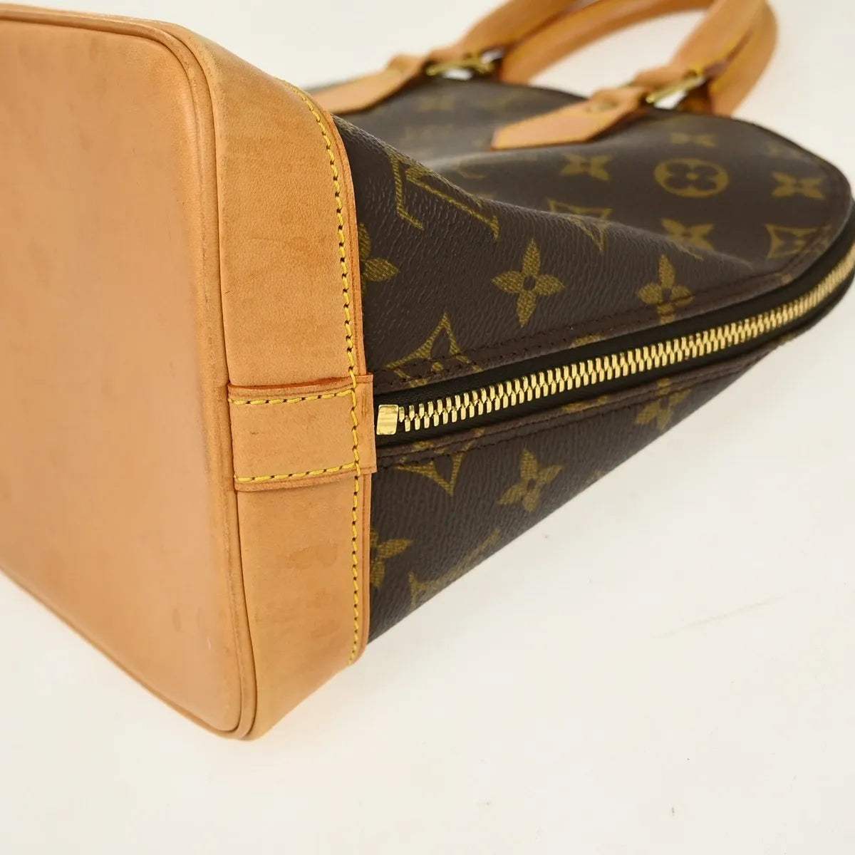 Louis Vuitton Alma Monogram Brown Canvas Handbag (Pre-Owned)
