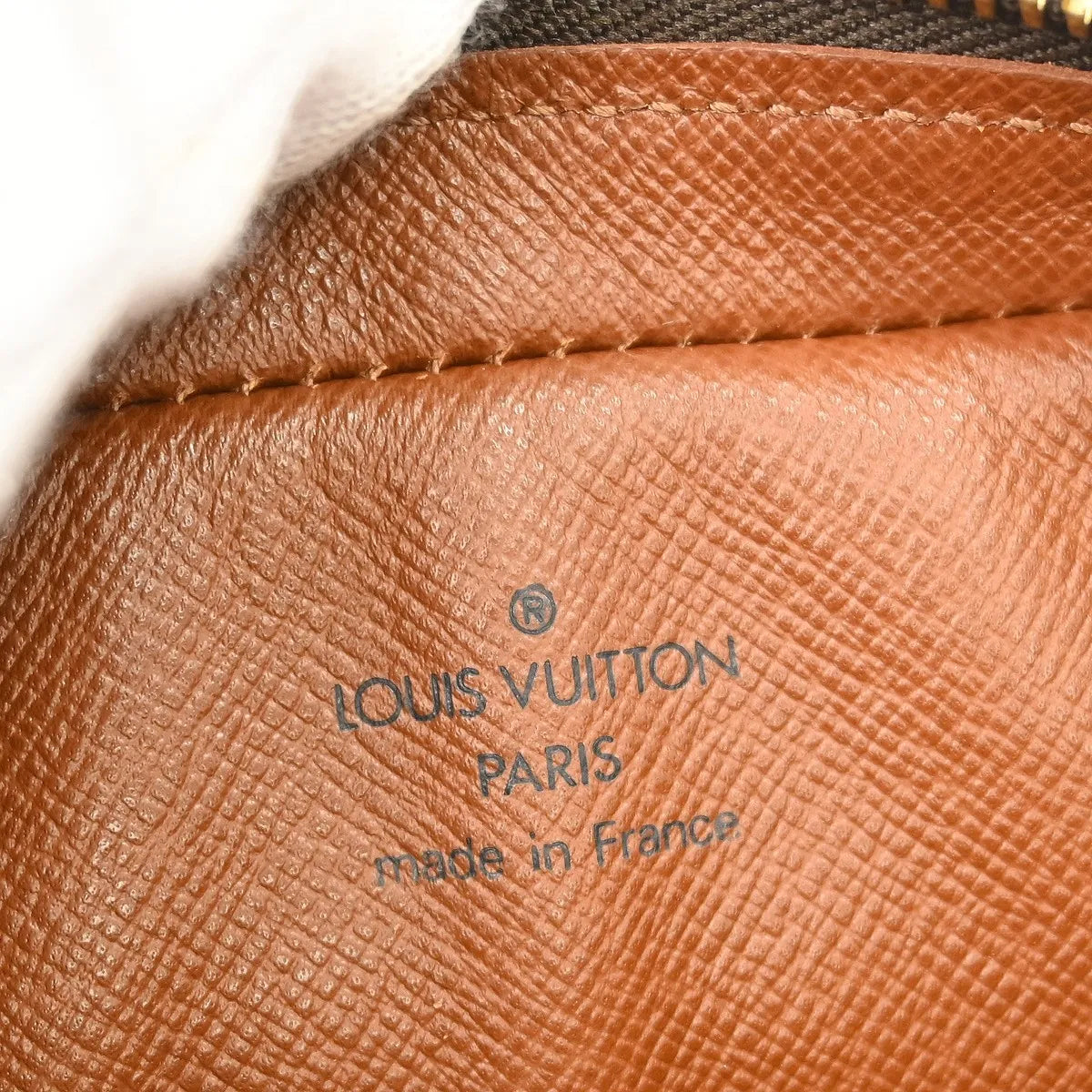 Louis Vuitton Cite Pochette Monogram Canvas Brown Canvas Clutche & Pouche Bag (Pre-Owned)