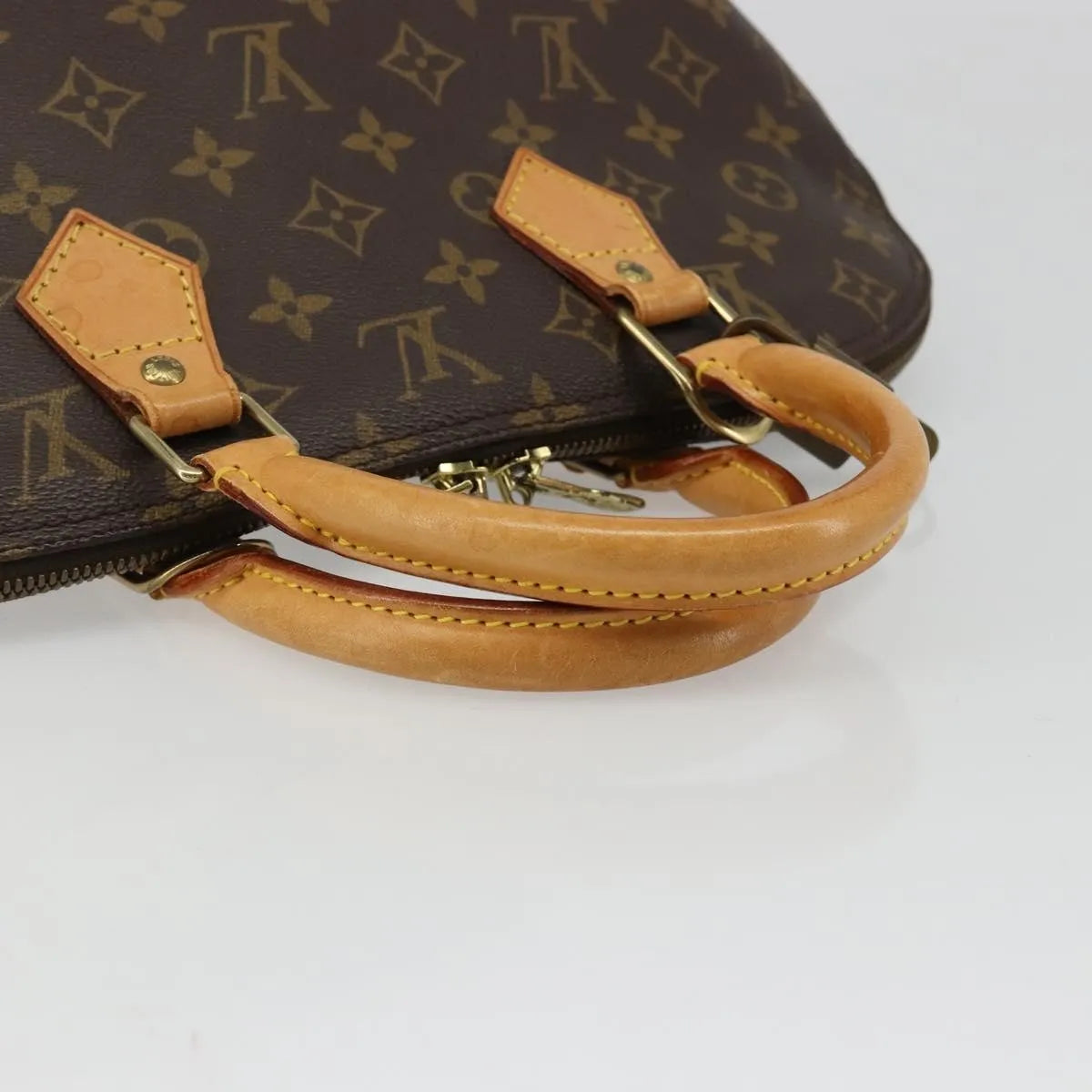 Louis Vuitton Alma Monogram Canvas Brown Canvas Handbag (Pre-Owned)