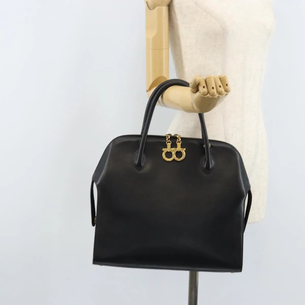 Salvatore Ferragamo Gancini Leather Black Leather Handbag (Pre-Owned)