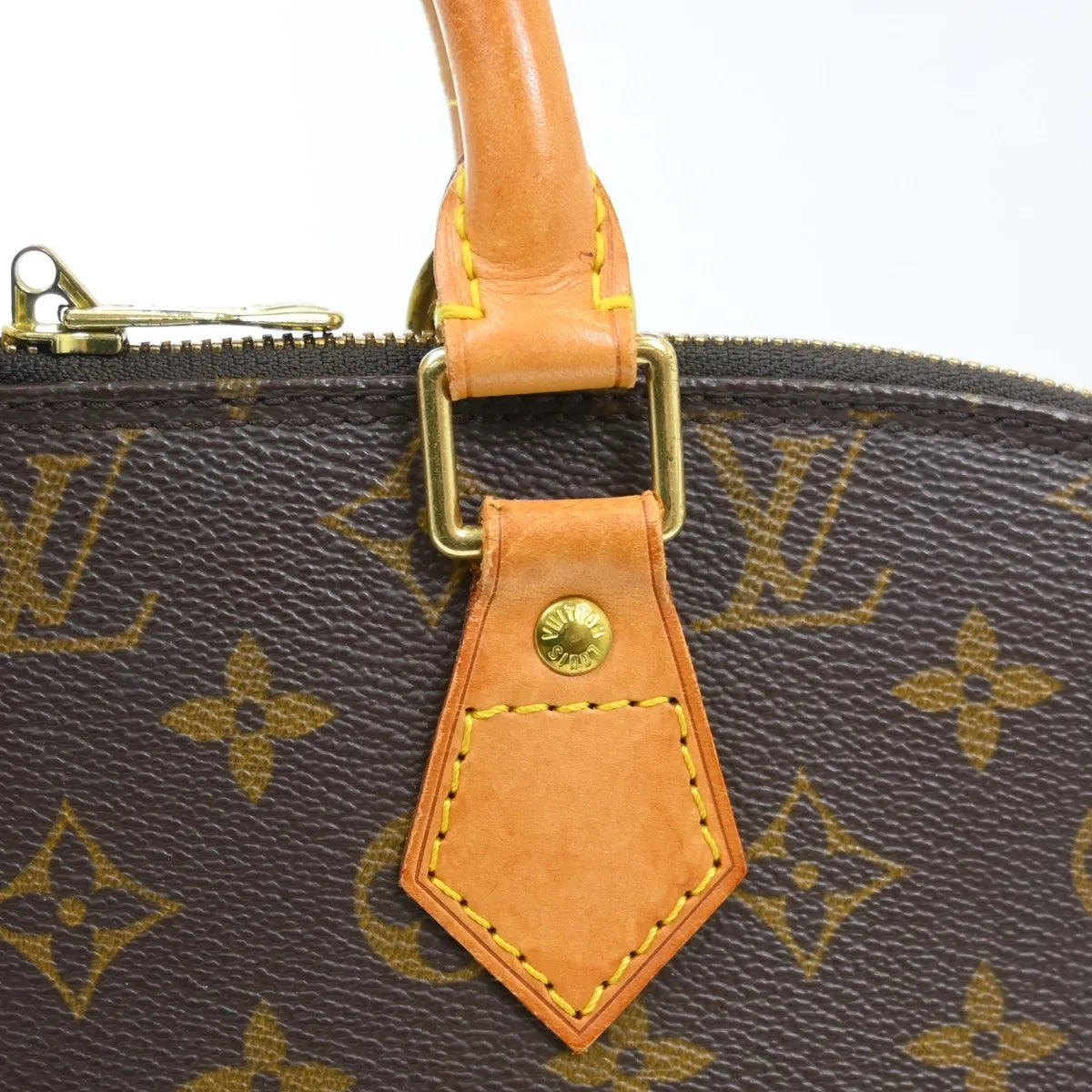 Louis Vuitton Alma Handbag Monogram Canvas Brown Canvas Handbag (Pre-Owned)