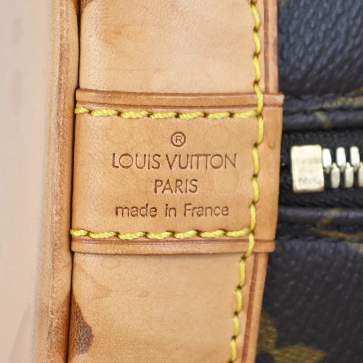 Louis Vuitton Alma Monogram Brown Canvas Handbag (Pre-Owned)