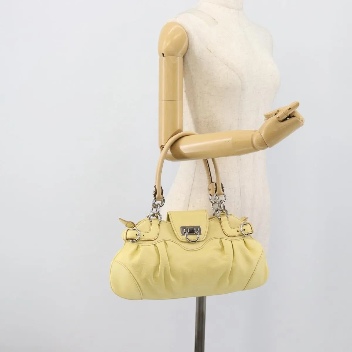 Salvatore Ferragamo Gancini Leather Yellow Leather Handbag (Pre-Owned)