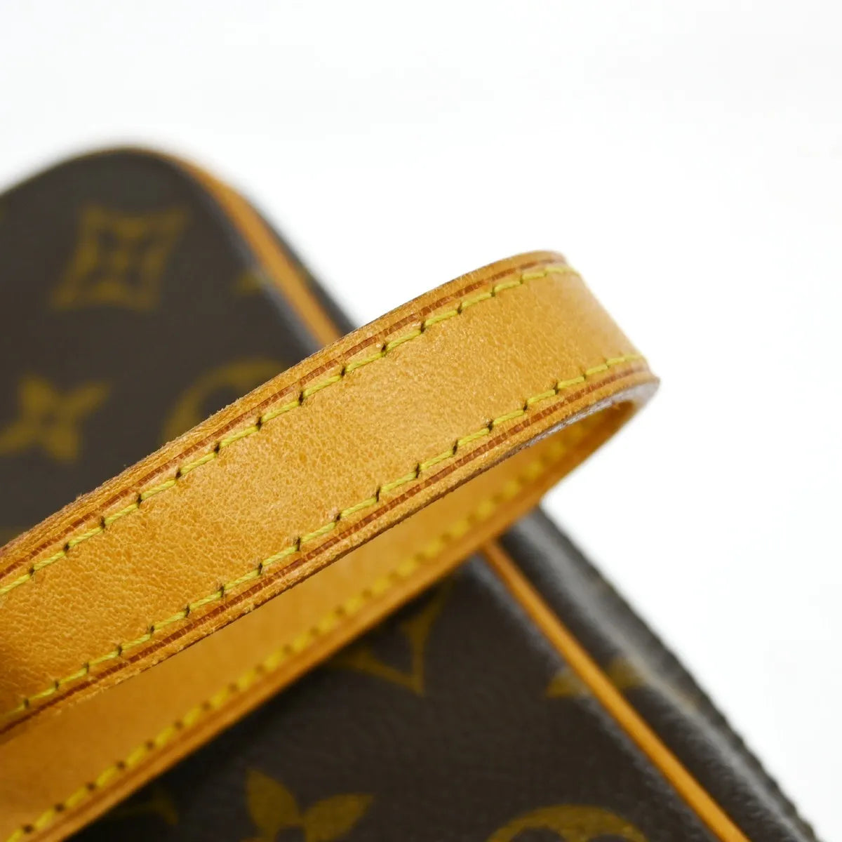 Louis Vuitton Cite Pochette Monogram Canvas Brown Canvas Clutche & Pouche Bag (Pre-Owned)