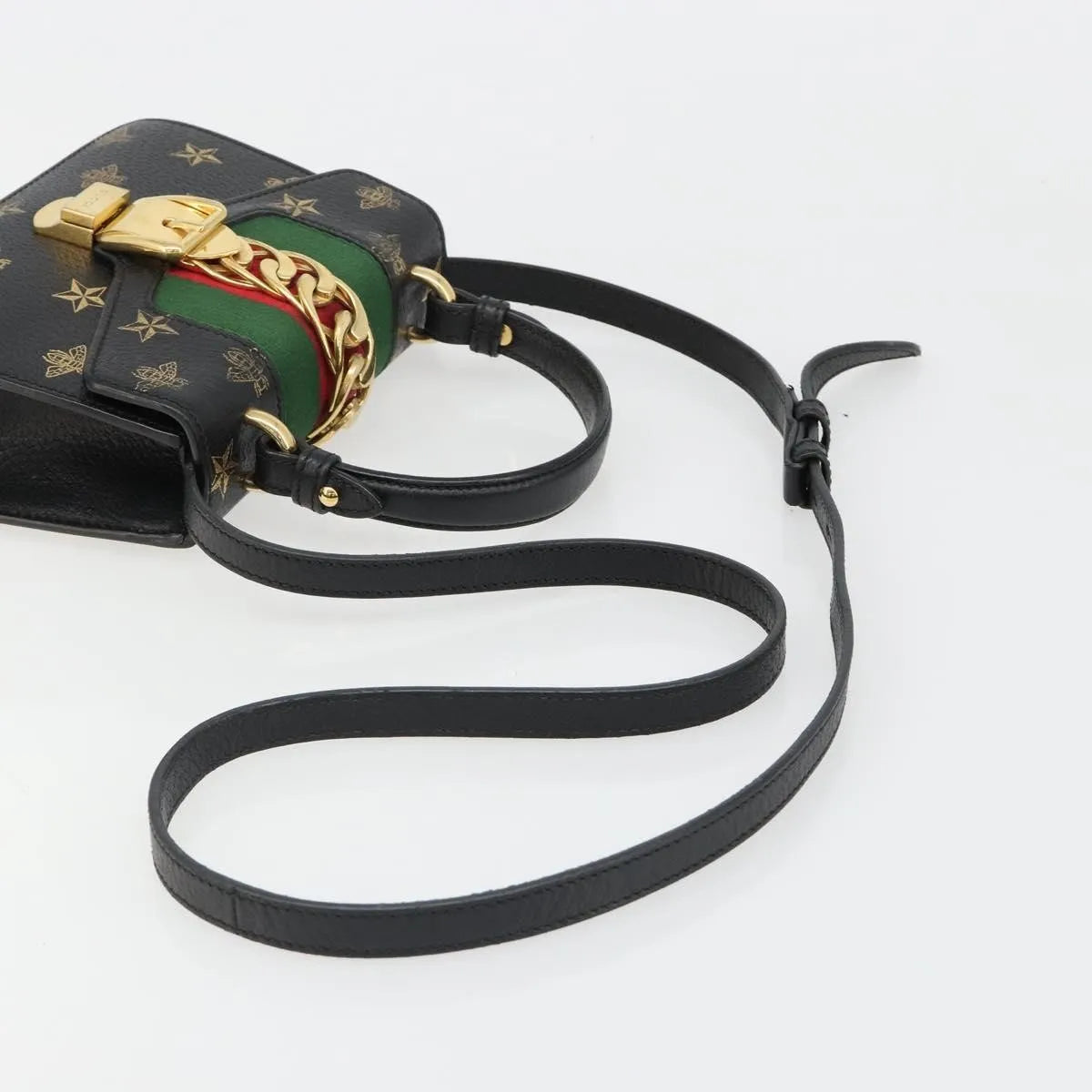Gucci Sylvie Top Handle Printed Leather Black Leather Handbag (Pre-Owned)