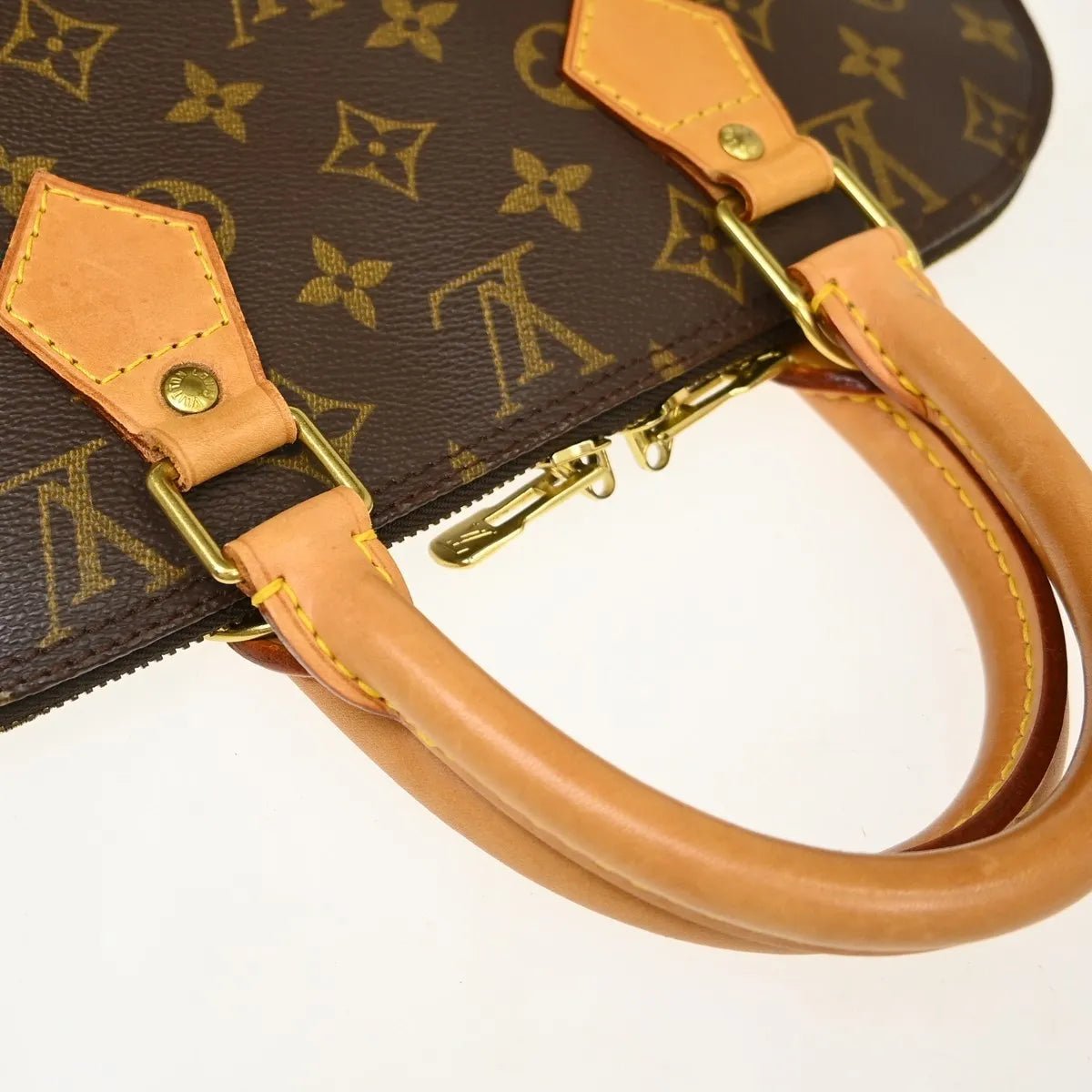 Louis Vuitton Alma Monogram Brown Canvas Handbag (Pre-Owned)
