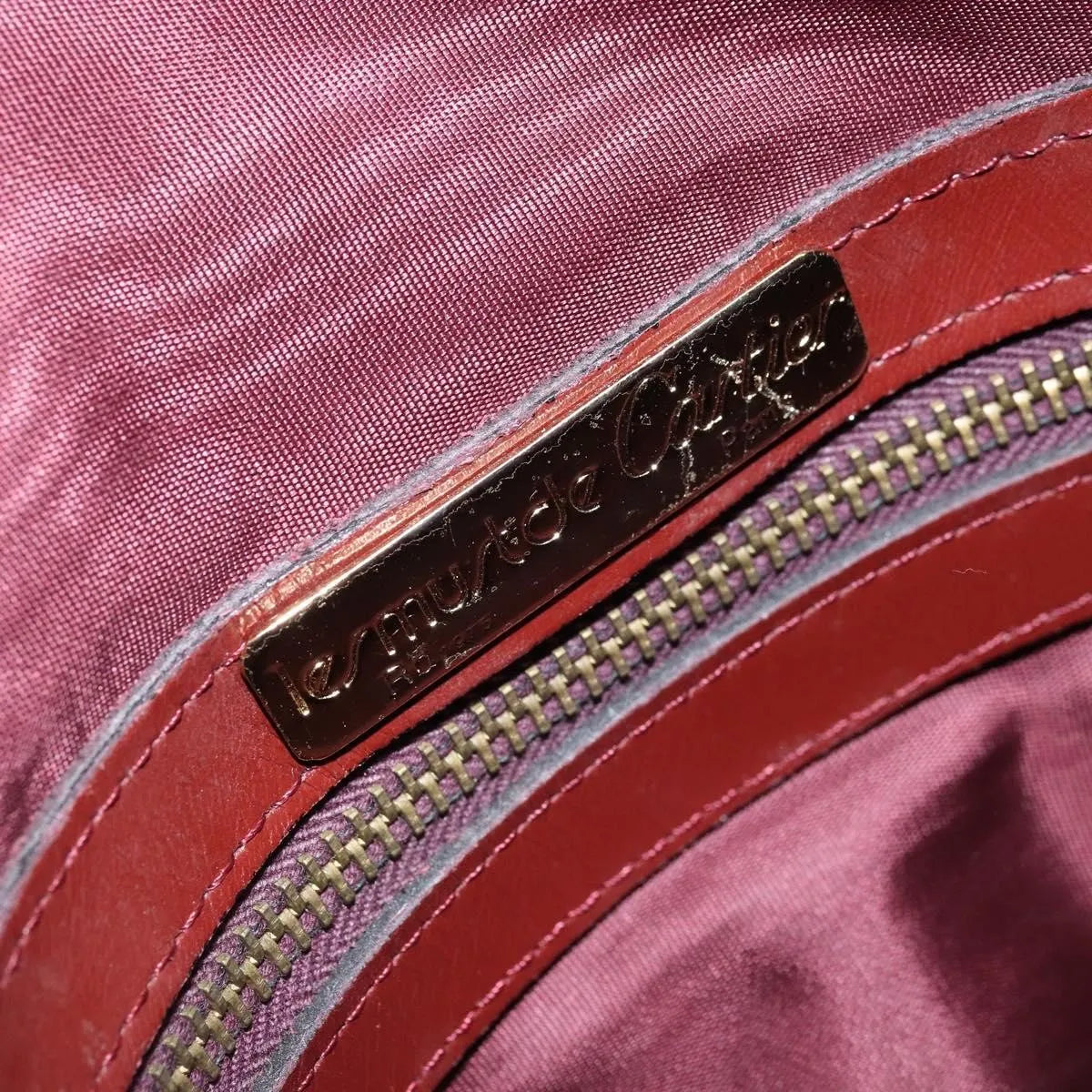 Cartier Must De Cartier Suede Burgundy Suede Handbag (Pre-Owned)