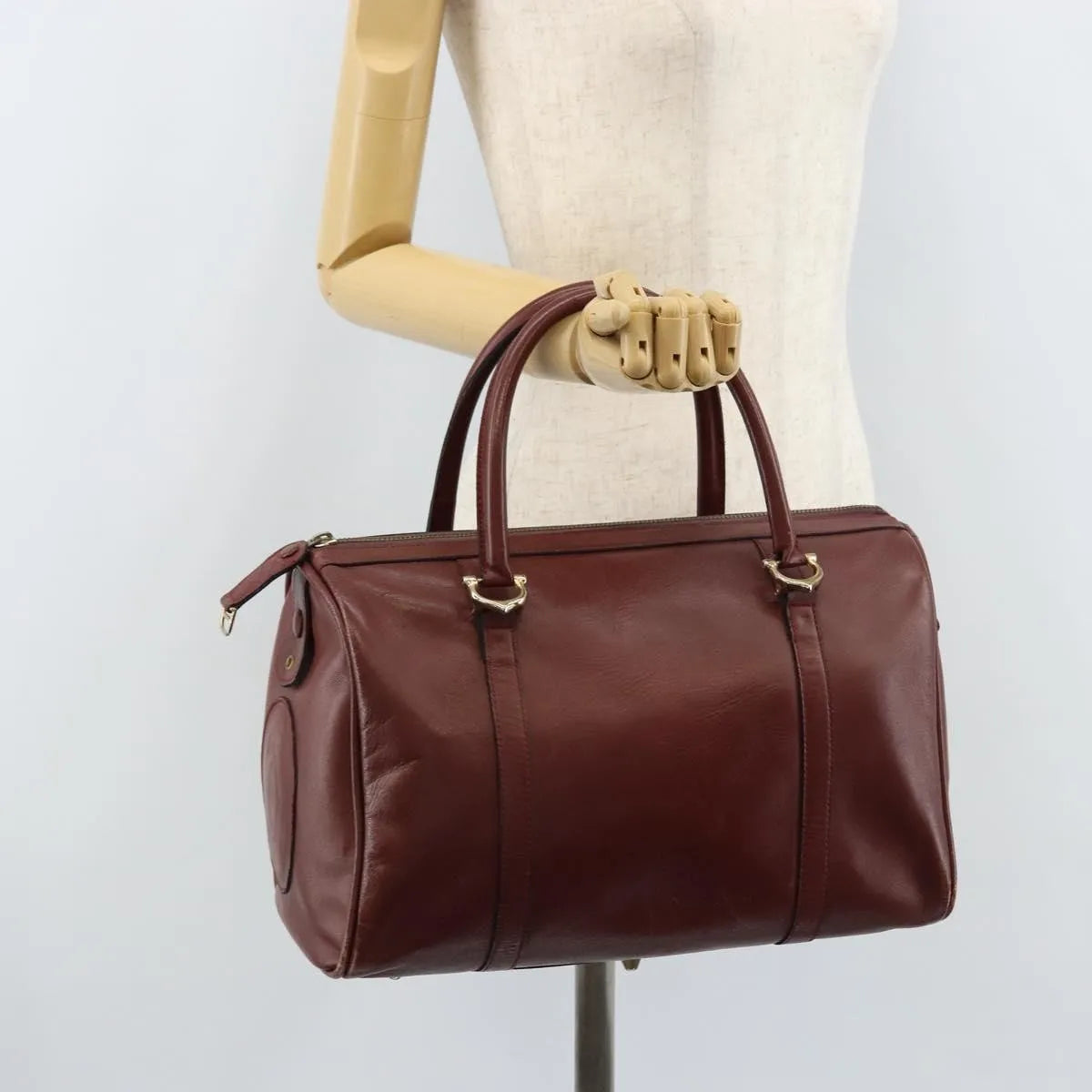 Cartier Must De Cartier Leather Burgundy Leather Handbag (Pre-Owned)