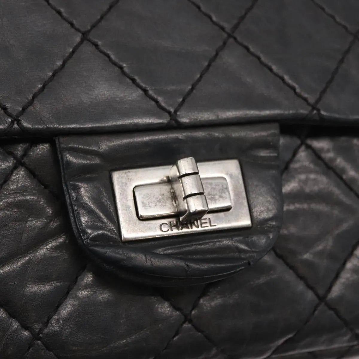 Chanel Reissue 2.55 Flap Quilted Aged Calfskin Black Leather Handbag (Pre-Owned)