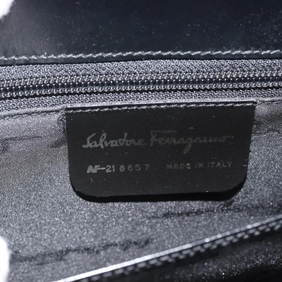 Salvatore Ferragamo Convertible Top Handle Leather Black Leather Handbag (Pre-Owned)