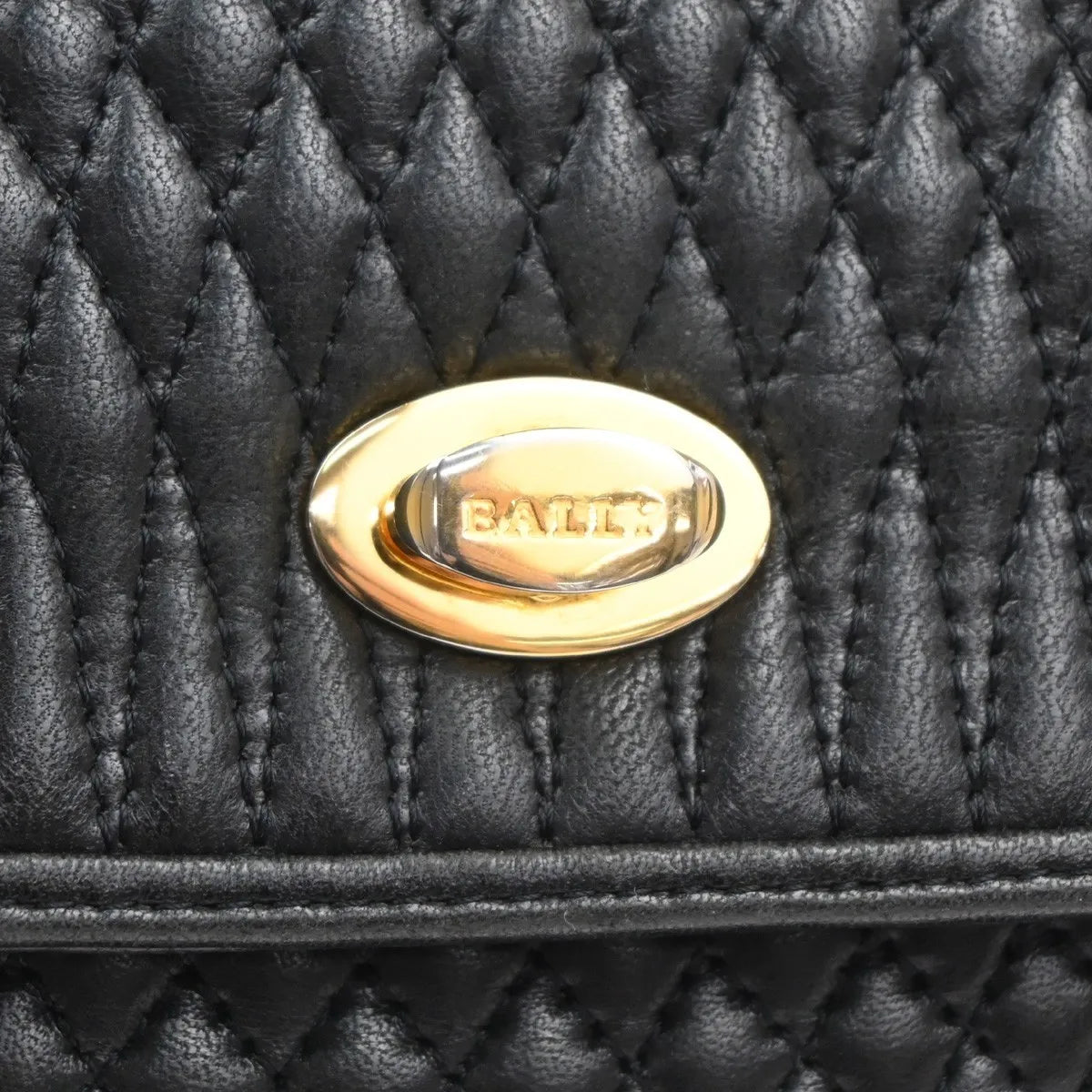 Bally Vintage Quilted Leather Black Leather Handbag (Pre-Owned)