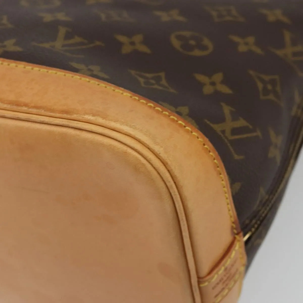 Louis Vuitton Alma Monogram Canvas Brown Canvas Handbag (Pre-Owned)
